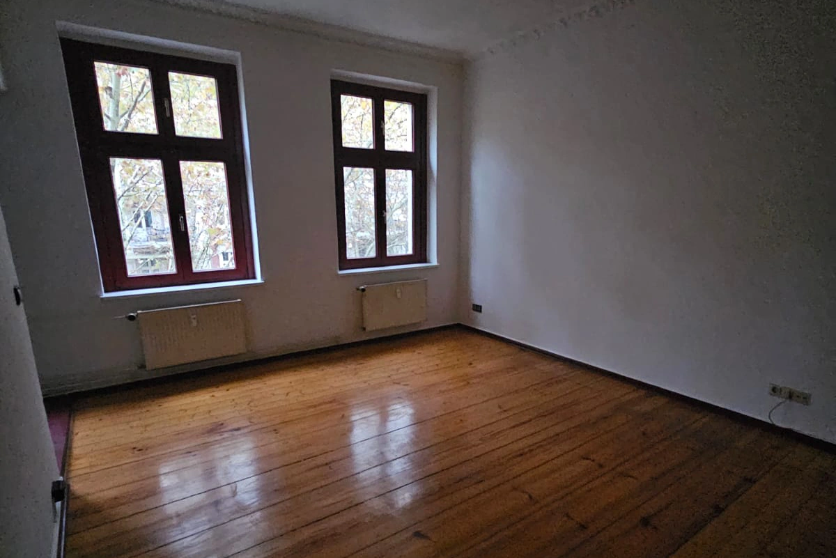 Fallstudie Wohnungsauflösung mit Renovierung in Berlin Mitte Wohnzimmer nachher